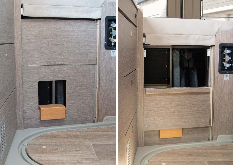 Camperinterieur met klepkast in schot bagageruimte